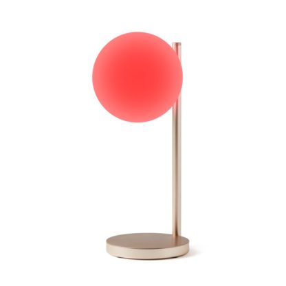 Lexon Bubble Lamp è una lampada da scrivania a luce bianca fredda o calda + 7 colori di illuminazione e caricabatterie wireless integrato. Accesa in rosso