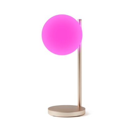 Lexon Bubble Lamp è una lampada da scrivania a luce bianca fredda o calda + 7 colori di illuminazione e caricabatterie wireless integrato. Accesa in fucsia