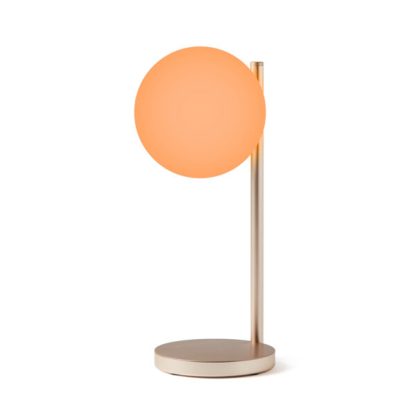 Lexon Bubble Lamp è una lampada da scrivania a luce bianca fredda o calda + 7 colori di illuminazione e caricabatterie wireless integrato. Accesa in arancio